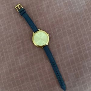 Michael Kors Gold fave with navy leather strap